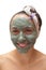 Woman with a clay mask