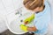 Woman Cleaning The Basin Of The Bathroom