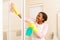 Woman cleaning bathroom