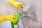 Woman cleaning bathtub