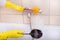 Woman cleaning bathtub