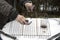 Woman Cleaning BBQ Grill