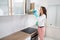 Woman Cleaning Cooker Hood