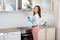 Woman Cleaning Cooker Hood