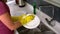 Woman cleaning dishes