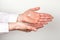 Woman cleaning hands with antibacterial alcohol disinfectant