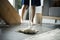 Woman cleaning home with mop