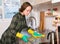 Woman cleaning kitchen surfaces