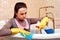 Woman from cleaning servisce sitting in bath