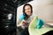 Woman Cleaning View From Inside The Oven