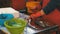 Woman Cleans and Cuts Fresh Fish in Fish Market