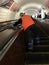 A woman cleans the escalator of the Kiev Metro Kyiv Metro