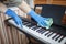 Woman cleans home  wipes dust from the piano and dreams about music  authentic inner life
