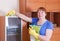 Woman cleans the house