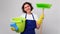 Woman cleans the house. The woman is holding a mop and a bucket and gloves and a cleaning sponge