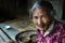 Woman and coffee in Bena Traditional Village