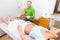 Woman at colon therapy with alternative practitioner
