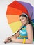 Woman with a colourful umbrella