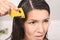 Woman combing out lice in her hair