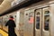 Woman Commuting on Subway Platform NYC MTA Subway Train Car Arriving