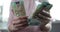 Woman considers Belarusian banknotes to be one hundred rubles