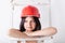 Woman in the construction hardhat