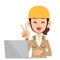A woman in the construction industry who operates a computer with a peace sign