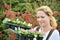 Woman with container-grown plants