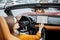 Woman controlling car with a digital dashboard
