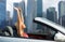 Woman in convertible car over singapore city