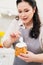 a woman cook decorates icing, fondant or marshmallow easter cakes.