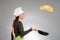 Woman cook flipping pancake