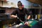 Woman Cook prepares food sushi kitchen