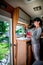 Woman cooking in camper, motorhome interior RV