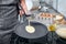 Woman cooking delicious thin pancakes on induction stove