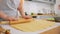 Woman cooking food and baking on kitchen at home