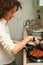 Woman cooking at home