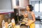 Woman cooking on modern induction cooker stove