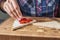 Woman cooking sandwiches toast with a fresh berries in the kitchen