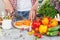 Woman cooks on the kitchen, soft focus background