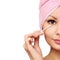 Woman with cotton swab. Skincare