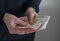 Woman counting euro banknotes