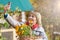 A woman in the country collects the autumn harvest of fruits