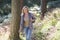 Woman On Country Walk Through Woodland