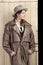 Woman in cowboy coat and hat