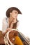 Woman cowgirl white blouse on saddle look side