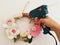 Woman creates shabby chic style floral garland