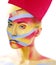 Woman with creative geometry make up, red, yellow, blue closeup