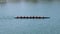 Woman Crew Rowing Team Working Out On River