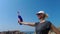 Woman with Croatian flag on Dubrovnik top